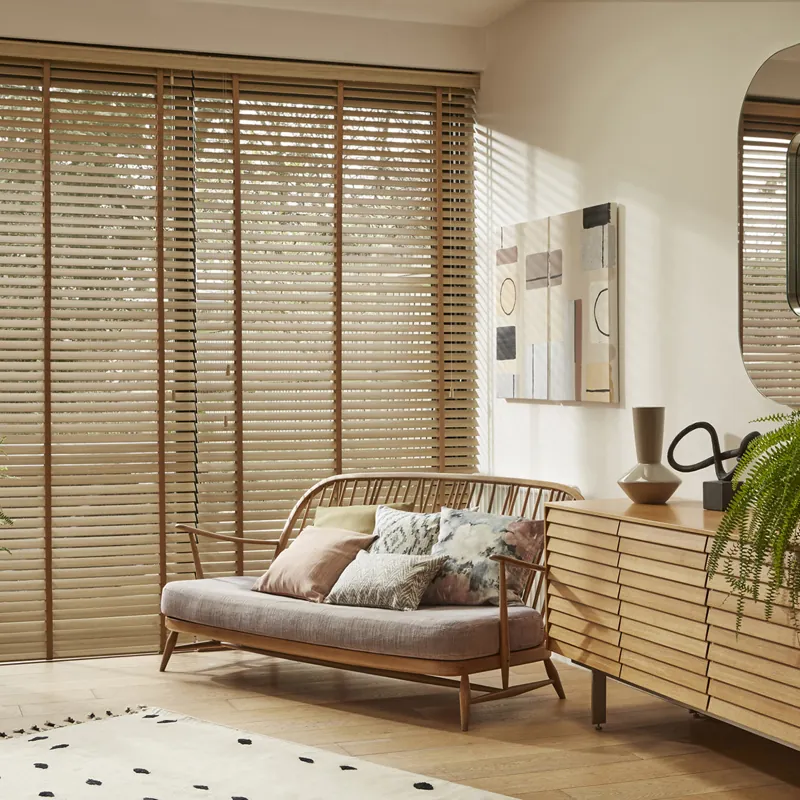 Modern living room with floor-to-ceiling wooden blinds