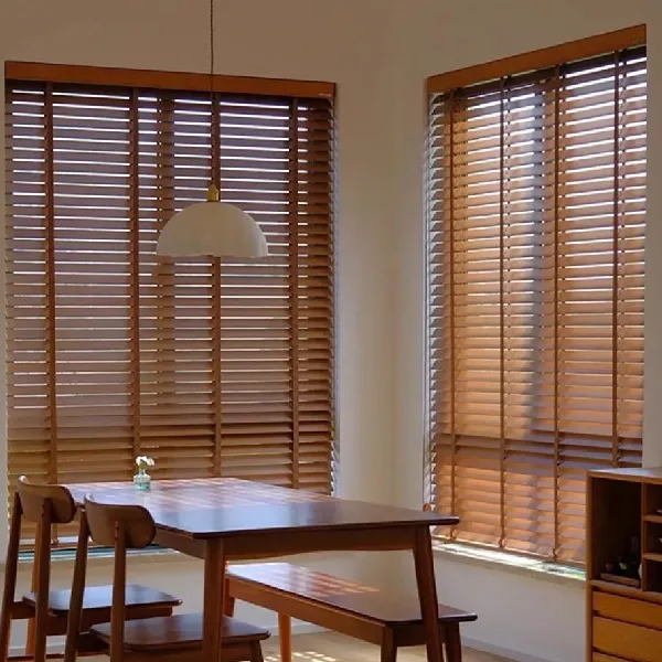 Wooden blinds in a bright dining area.