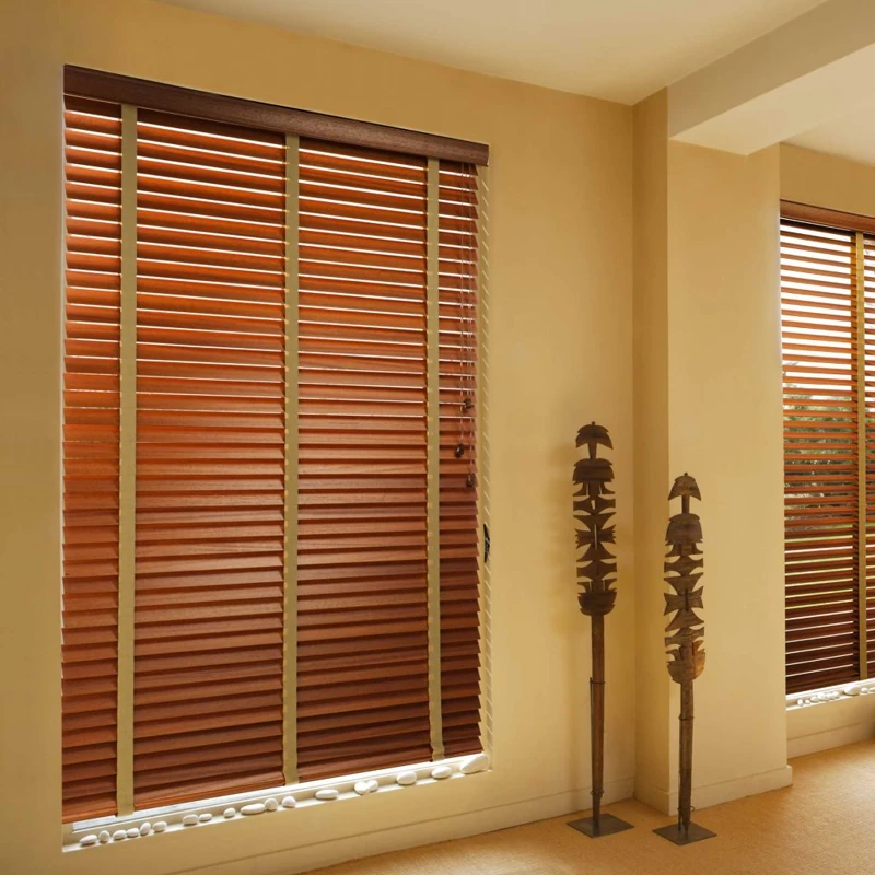 Wooden blinds with fabric tape beside floor sculptures.