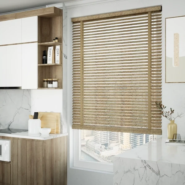 Kitchen window with brown speckled Venetian blinds.