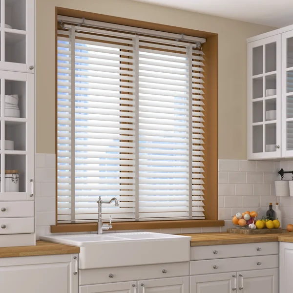 Kitchen window with white Venetian blinds installed
