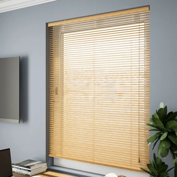 Light wood blinds installed on a window in a home office