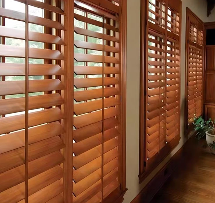 Warm wood plantation blinds on multiple windows