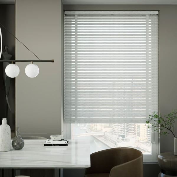 White textured window wooden blinds in a dining room