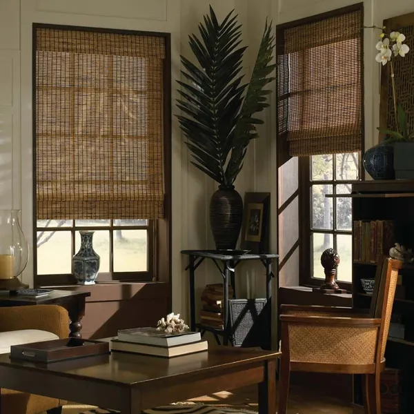 Woven wood blinds on two windows
